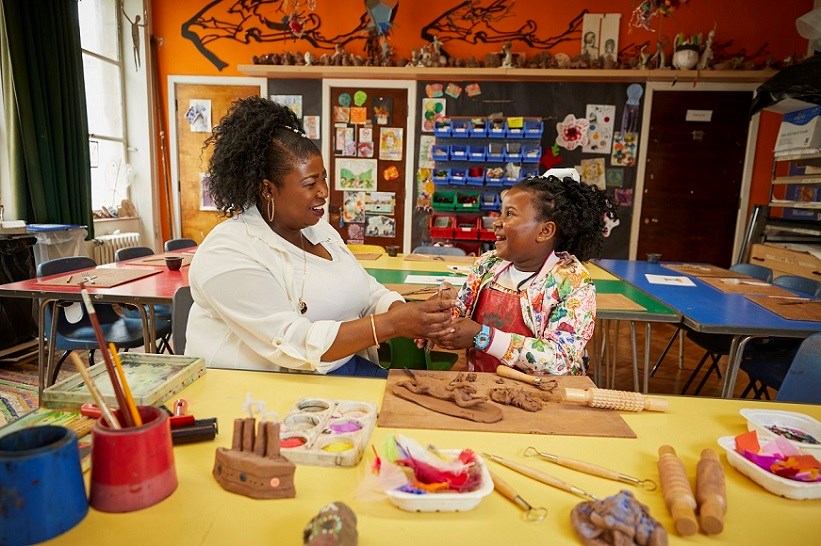 Adult and child participating in clay workshop at Southampton City Art Gallery