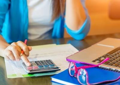 Woman with calculator