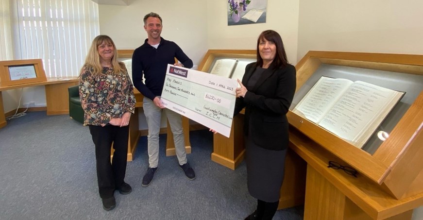 Maggie's Southampton representatives receiving their cheque