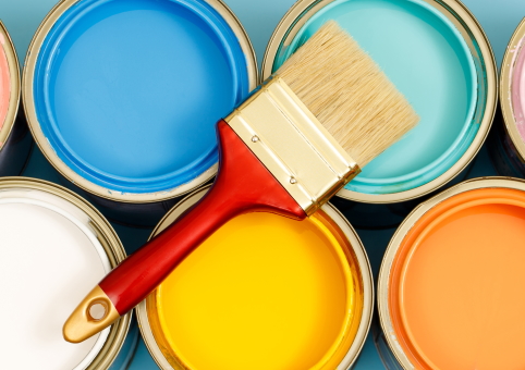 Paint brush on top of wall paints