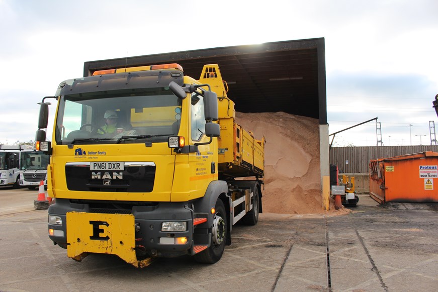 Gritter vehicle loading at salt barn