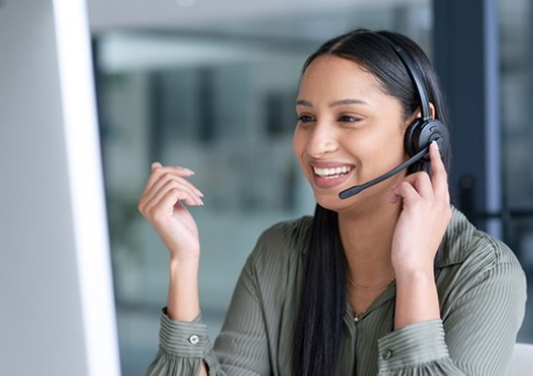 Someone talking happily on a headset