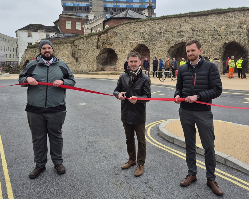 A photo of (from left to right) Richard Tyldsley, General Manager at Bluestar Bus Services, Councillor Eamonn Keogh, Cabinet Member for Environment and Transport, and Adam Twekesbury, Associate Director, Environment & Sustainability at University of Southampton, cutting the ribbon at Albion Place