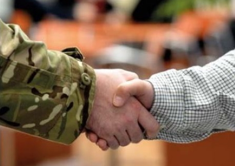 Soldier shaking someone's hand