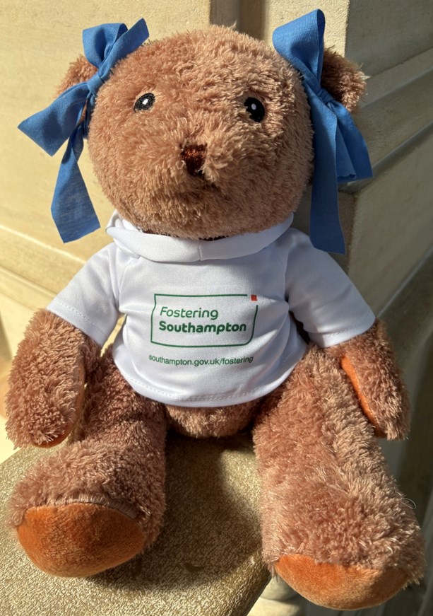 A teddy bear wearing a Fostering Southampton t-shirt