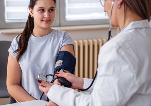 Young person getting their blood pressure measured