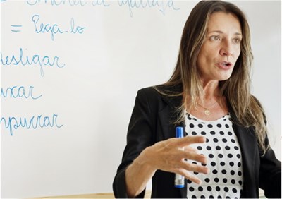 Teacher in front of whiteboard