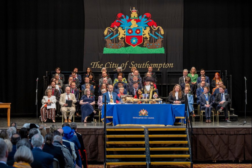 Mayor making event showing the Lord Mayor and Councillors on stage