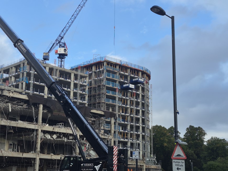 The cycle of regeneration. The demolition of the former Debenhams building enters its final stages, while behind it the Bargate Quarter rises upwards.
