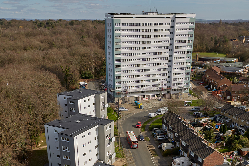 Low-rise and high-rise residential blocks alongside terraced housing