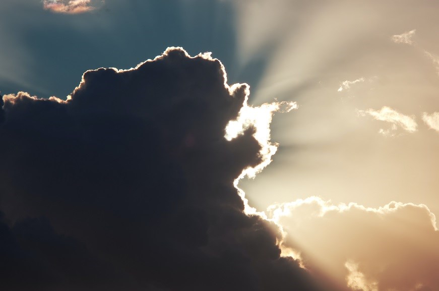 Sun rays behind cloud