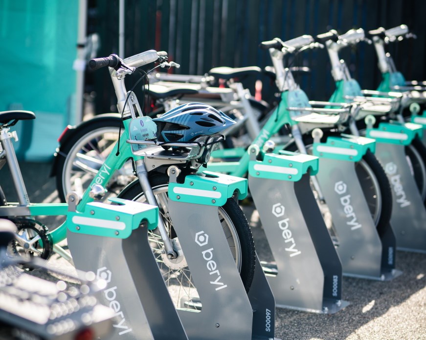 A row of Beryl bikes in their racks