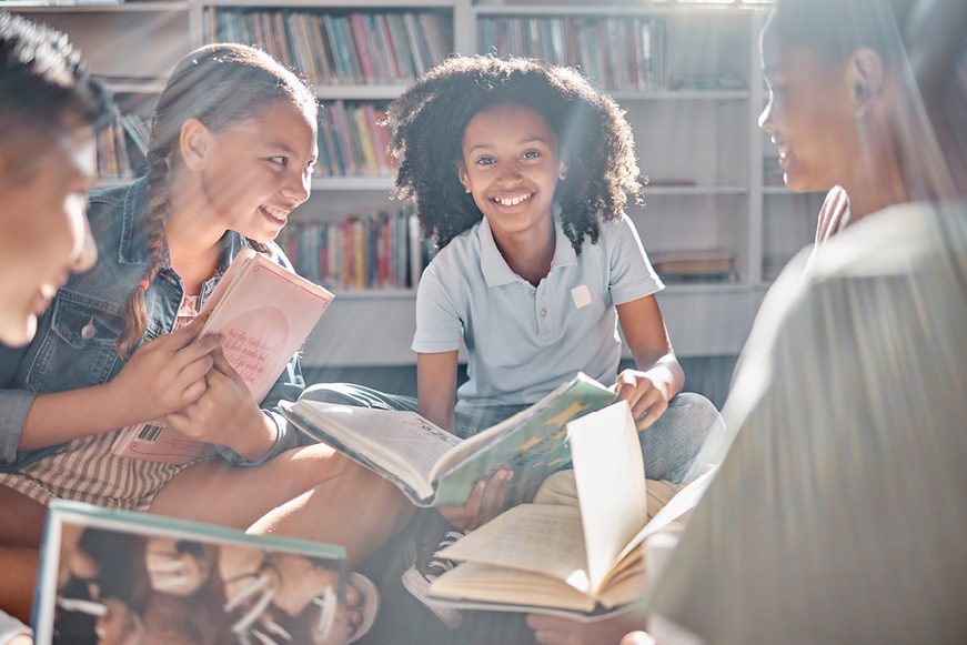 A group of children reading A group of children reading