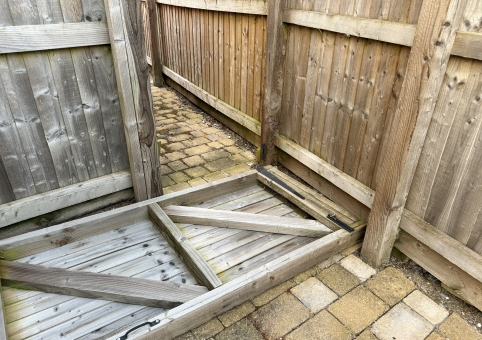 A fallen fence panel