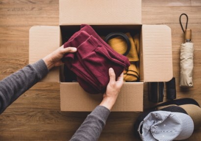 Box of belongings being packed