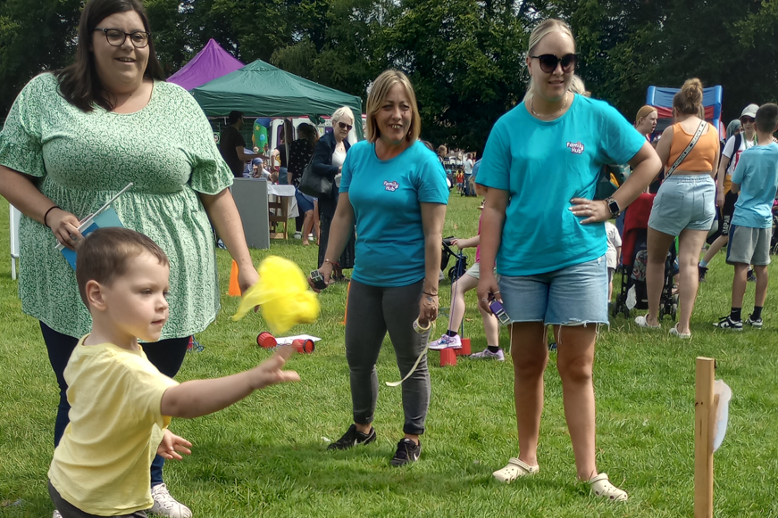 Family Playing At Family Hub Community Event Family Playing At Family Hub Community Event