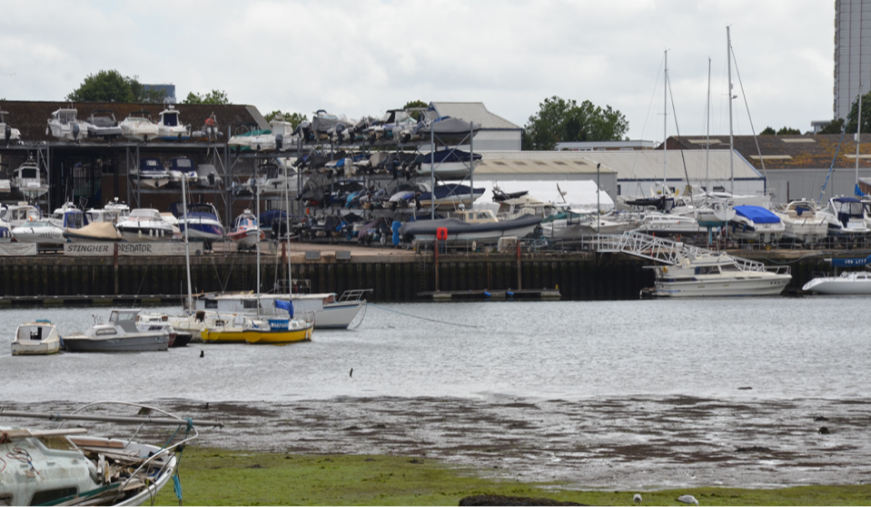 The river Itchen, including the shoreline and several boats