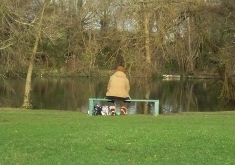 Someone on a bench fishing