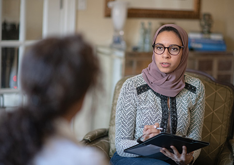 Woman speaking to a professional