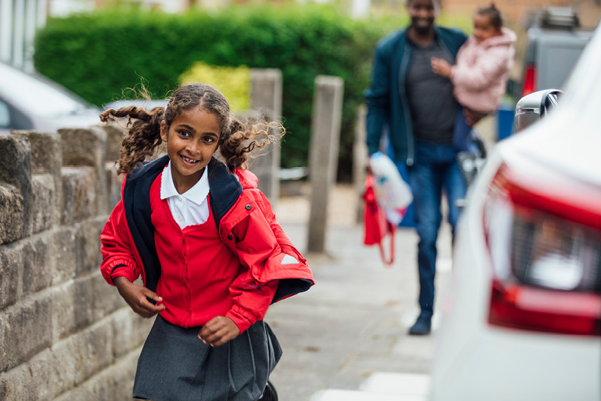 A schoolgirl running