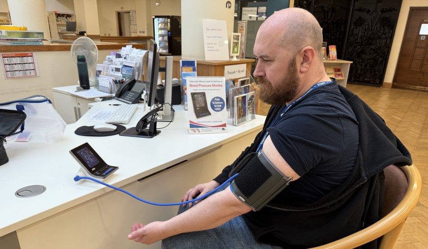 Image of a resident having their blood pressure taken