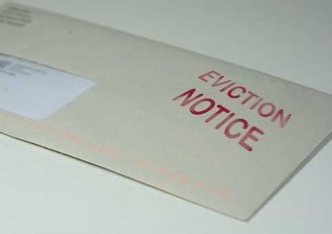 Envelope with 'Eviction notice' written on it