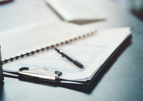 Clipboard with paperwork