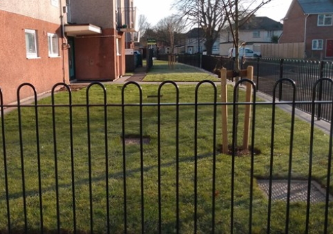 Fence around a green space