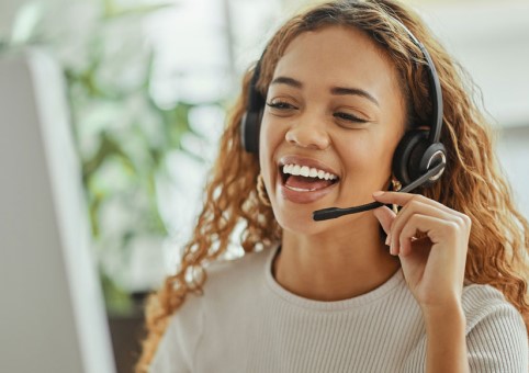 Someone talking happily on a headset