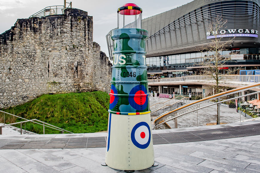 A lighthouse sculpture by the City Walls and West Quay