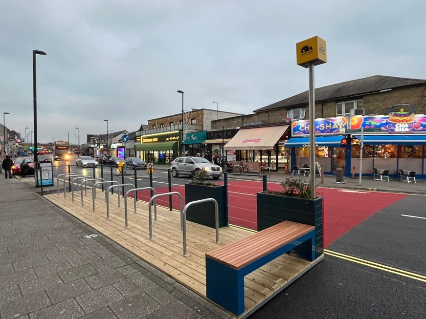 A photo of the new cycle parking, seating and the in-progress bus gate adjacent to the junction with Westridge Road.