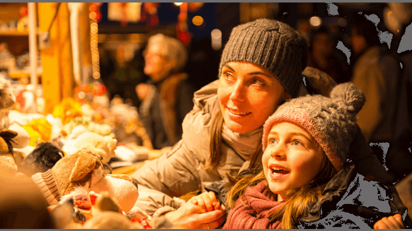 Mother and child at a Christmas market