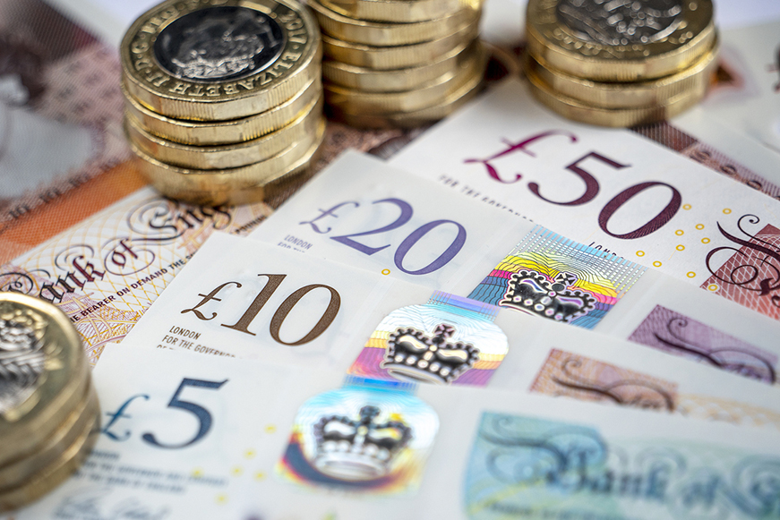 Piles of coins and banknotes