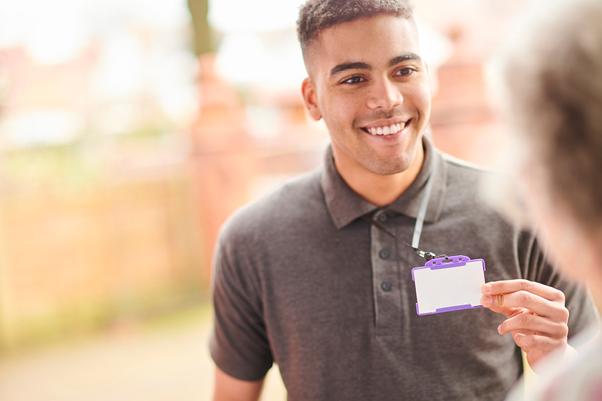 A man showing his ID to a tenant