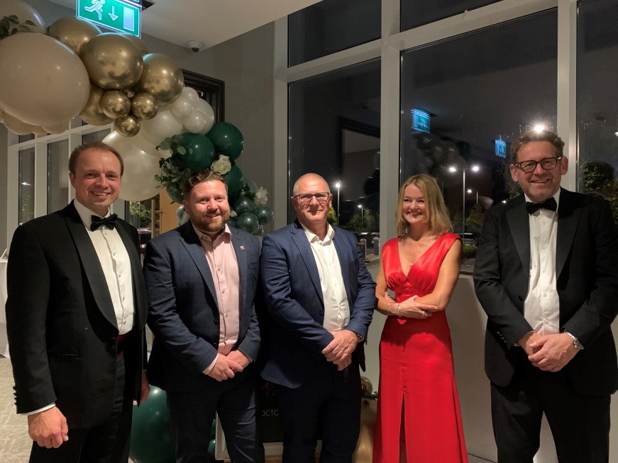 Attendees at the Ball wearing formal clothing