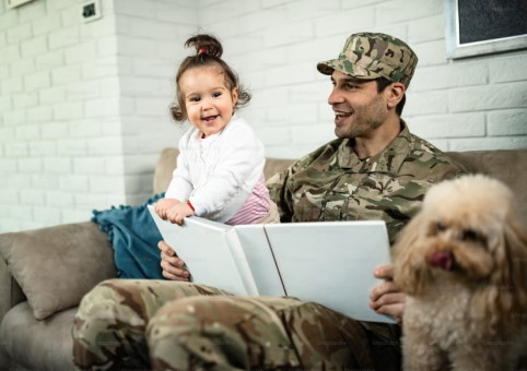 A soldier with a dog and his daughter