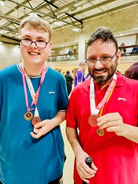 Callum and Matthew with their medals