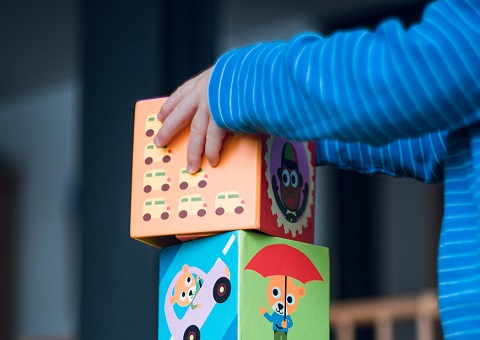 An infant stacking play boxes