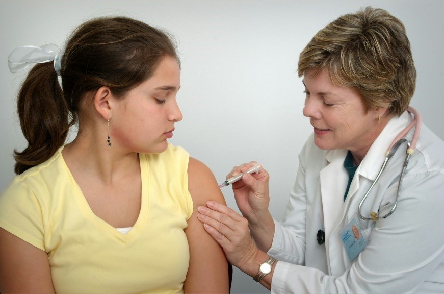 A young person receiving a vaccination